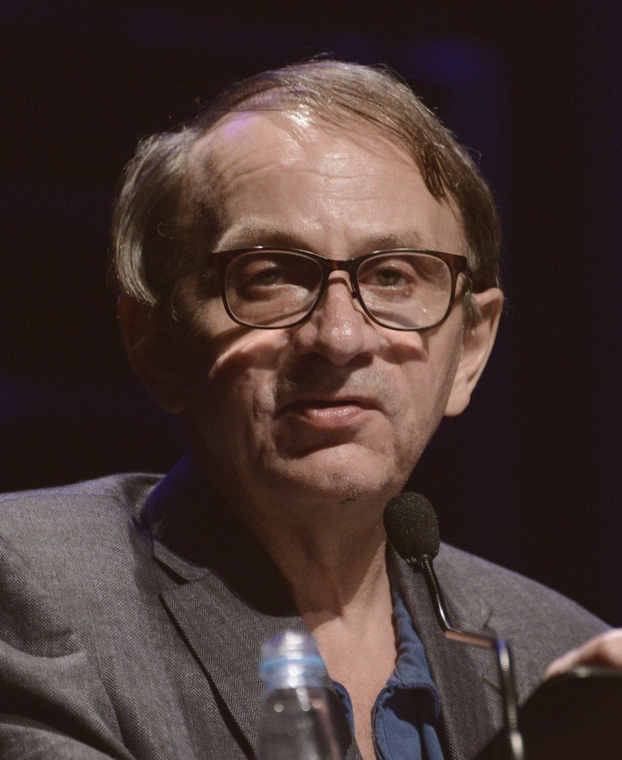 Portrait of Houellebecq, characteristically dishevelled and deadpan